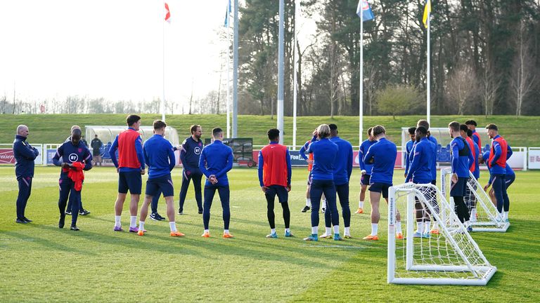 The England squad huddle up during a training session at St George&#39;s Park, Burton-upon-Trent. Picture date: Tuesday March 22, 2022.