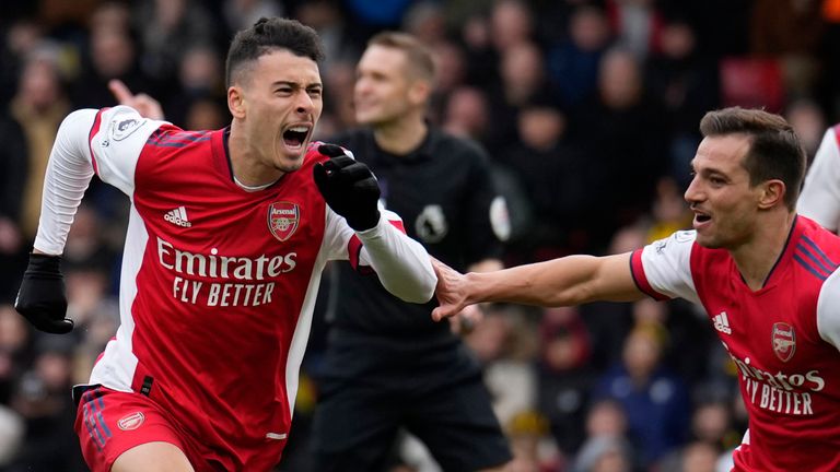 Arsenal&#39;s Gabriel Martinelli celebrates with his team-mates after he scored his side&#39;s third goal (AP)