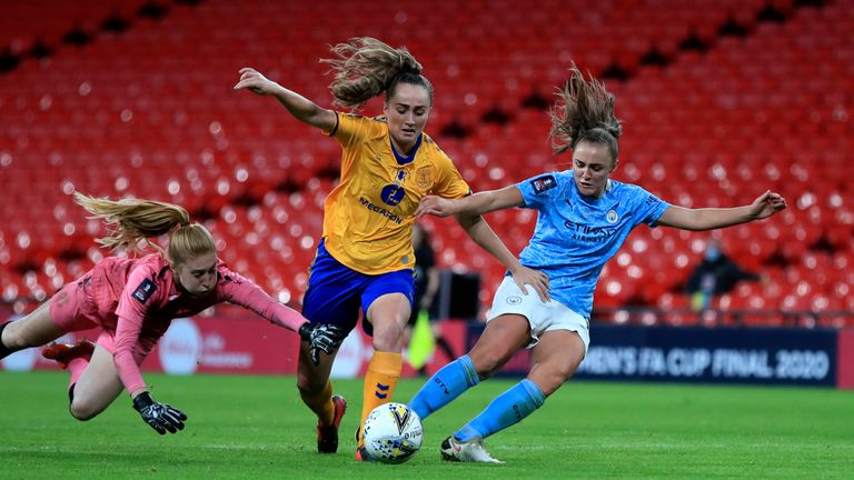 Everton's goalkeeper Alexandra MacIver makes a save in front of Manchester City's Georgia Stanway during the Women's FA Cup final soccer match between Everton and Manchester City at Wembley stadium in London