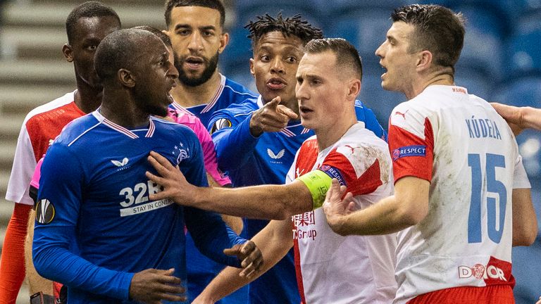 GLASGOW, SCOTLAND - MARCH 18: Rangers&#39; Glen Kamara takes exception to something said by Slavia&#39;s Ondrej Kudela during the UEFA Europa League Round of 16 2nd Leg match between Rangers FC and Slavia Prague at Ibrox Stadium on March 18, 2021, in Glasgow, Scotland.  (Photo by Alan Harvey / SNS Group)
