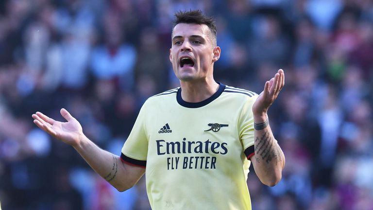 Granit Xhaka reacts after being booked against Aston Villa