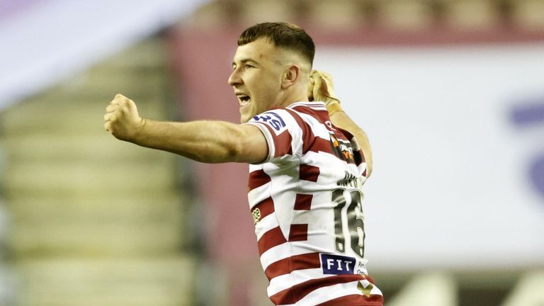 Wigan Warriors v Hull FC - Betfred Super League - DW Stadium
Wigan Warriors&#39; Harry Smith celebrates kicking the winning drop goal during the Betfred Super League match at the DW Stadium, Wigan. Picture date: Thursday March 31, 2022.