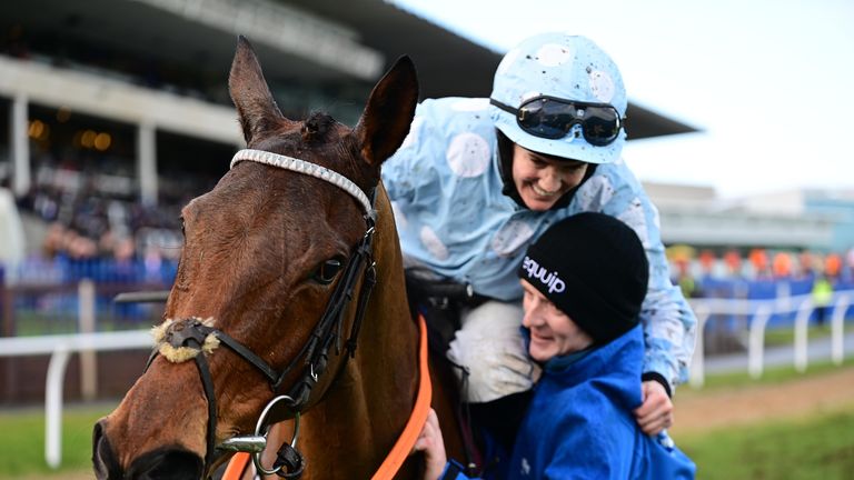 Rachael Blackmore greets groom Colman Comerford after Honeysuckle's win in the Irish Champion Hurdle