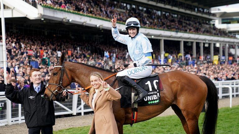 Rachael Blackmore and Honeysuckle pose for the cameras after victory in the 2022 Champion Hurdle at Cheltenham