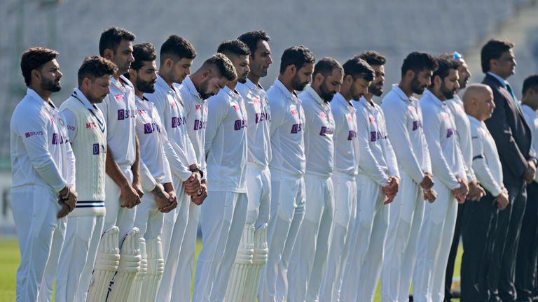 A moment of silence is marked by the Indian and Sri Lankan cricket teams for Australian cricketers Rod Marsh and Shane Warne, who recently passed away, ahead of the second day of the first test match between India and Sri Lanka in Mohali, India, Saturday, March 5, 2022. 