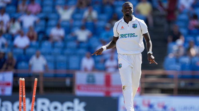 West Indies' Jayden Seales celebrates taking the wicket of England's Chris Woakes during day one of their third Test cricket match at the National Cricket Stadium in St. George, Grenada, Thursday, March 24, 2022. (AP Photo/Ricardo Mazalan)