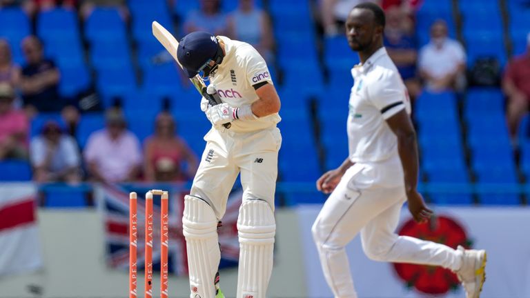 Joe Root looks on after being bowled by West Indies' Kemar Roach