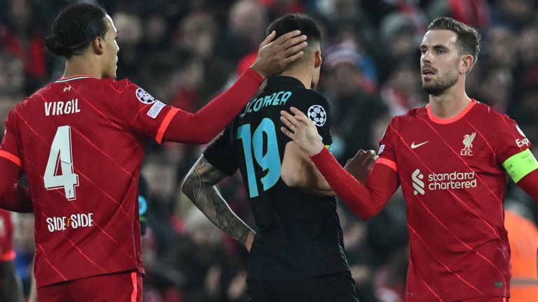 Virgil van Dijk and Jordan Henderson after Liverpool qualified for the Champions League quarter-finals despite defeat on the night to Inter