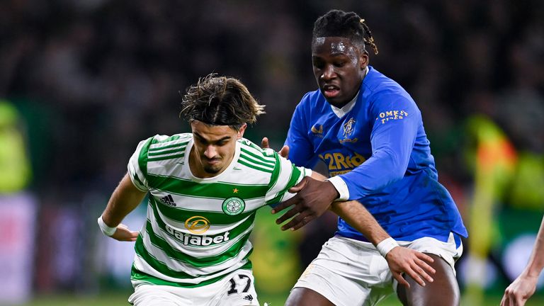 GLASGOW, SCOTLAND - FEBRUARY 02: Celtic's Jota (L) and Rangers' Calvin Bassey during a cinch Premiership match between Celtic and Rangers at Celtic Park, on February 02, 2022, in Glasgow, Scotland. (Photo by Rob Casey / SNS Group)