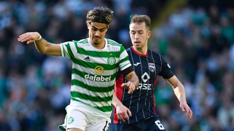 GLASGOW, SCOTLAND - MARCH 19: Celtic's Jota (L) and Ross County's Harry Paton during a cinch Premiership match between Celtic and Ross County at Celtic Park, on March 19, 2022, in Glasgow, Scotland.  (Photo by Rob Casey / SNS Group)