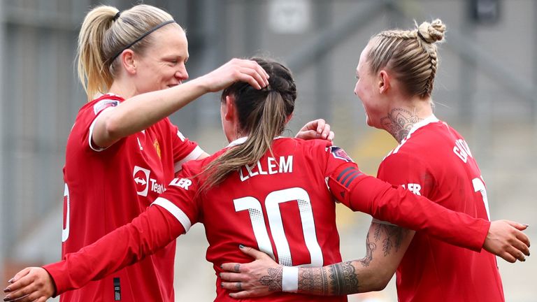 LEIGH, ENGLAND - MARCH 05: Katie Zelem of Manchester United celebrates with Diane Caldwell and teammates after scoring their side&#39;s fourth goal directly from a corner during the Barclays FA Women&#39;s Super League match between Manchester United Women and Leicester City Women at Leigh Sports Village on March 05, 2022 in Leigh, England. (Photo by Clive Brunskill/Getty Images)