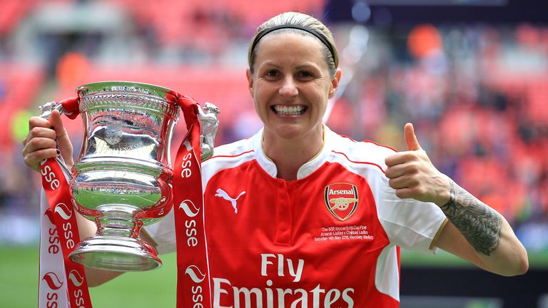 Arsenal&#39;s Kelly Smith holds the trophy and celebrates after winning the SSE Women&#39;s FA Cup Final at Wembley Stadium, London.