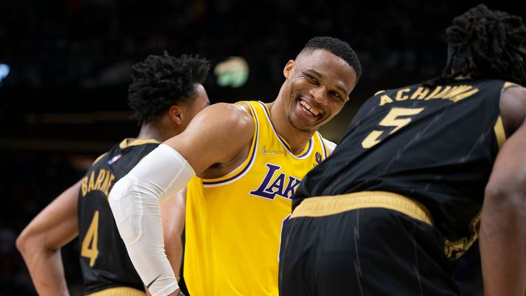 Los Angeles Lakers Russell Westbrook reacts as LeBron James takes a free throw during the second half of an NBA basketball game against the Toronto Raptors, Friday, March 18, 2022 in Toronto. (Chris Young/The Canadian Press via AP)


