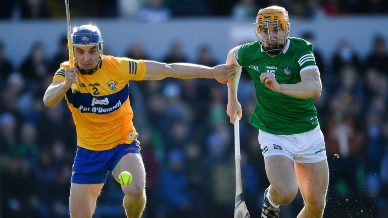 6 March 2022; Adam English of Limerick is tackled by Rory Hayes of Clare during the Allianz Hurling League Division 1 Group A match between Clare and Limerick at Cusack Park in Ennis, Clare. Photo by Ray McManus/Sportsfile