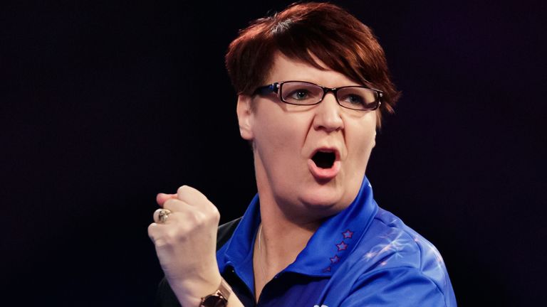 Lisa Ashton celebrates during her match against Jan Dekker during day one of the William Hill Darts Championships at Alexandra Palace, London.