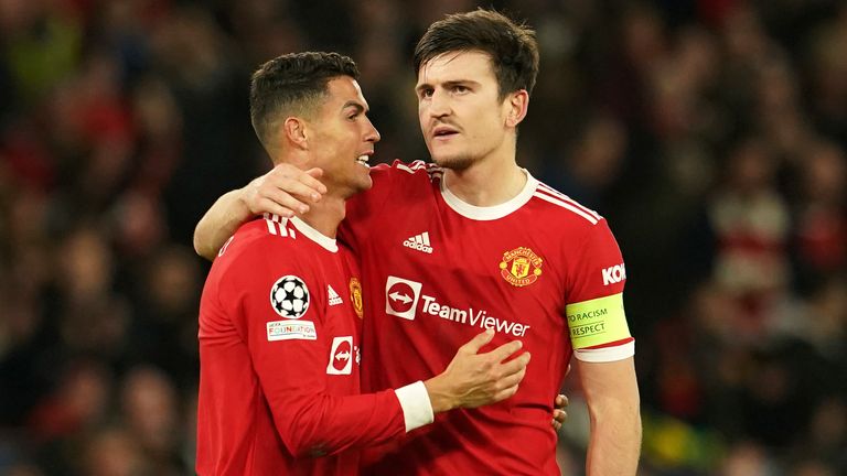 Manchester United&#39;s Cristiano Ronaldo, left, and Manchester United&#39;s Harry Maguire celebrate after the the Champions League Group F soccer match between Manchester United and Atalanta at Old Trafford, Manchester, England, Wednesday, Oct. 20, 2021.
