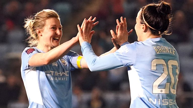 Ellen White celebrates with Lucy Bronze after scoring against Everton Women