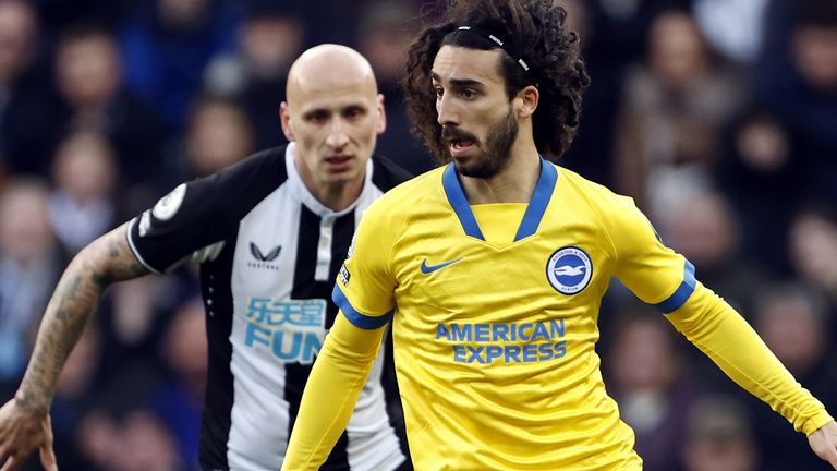 Marc Cucurella (right) and Newcastle United's Jonjo Shelvey