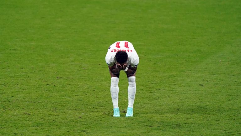 Marcus Rashford stands dejected after missing from the penalty spot during the Euro 2020 final.
