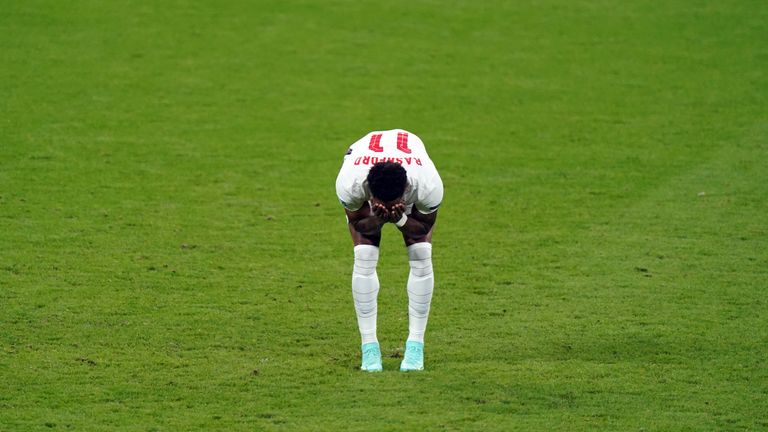 Marcus Rashford stands dejected after missing from the penalty spot during the Euro 2020 final.
