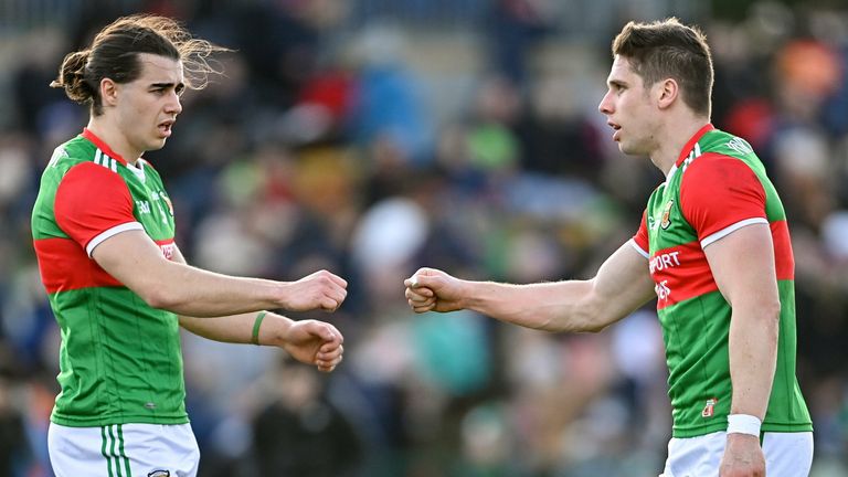 27 February 2022; Oisin Mullin, left, and Lee Keegan of Mayo after the Allianz Football League Division 1 match between Mayo and Armagh at Dr Hyde Park in Roscommon. Photo by Ramsey Cardy/Sportsfile