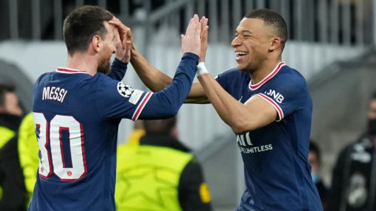 Kylian Mbappe is congratulated by Lionel Messi after putting PSG 2-0 up on aggregate