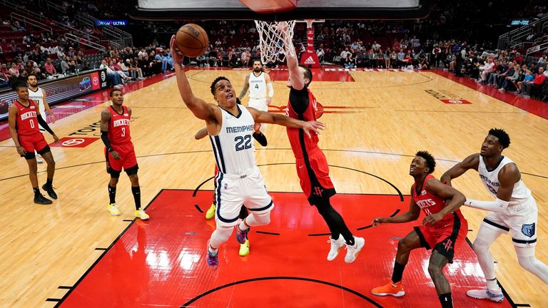Memphis Grizzlies guard Desmond Bane drives to the basket as Houston Rockets guard Garrison Mathews defends.