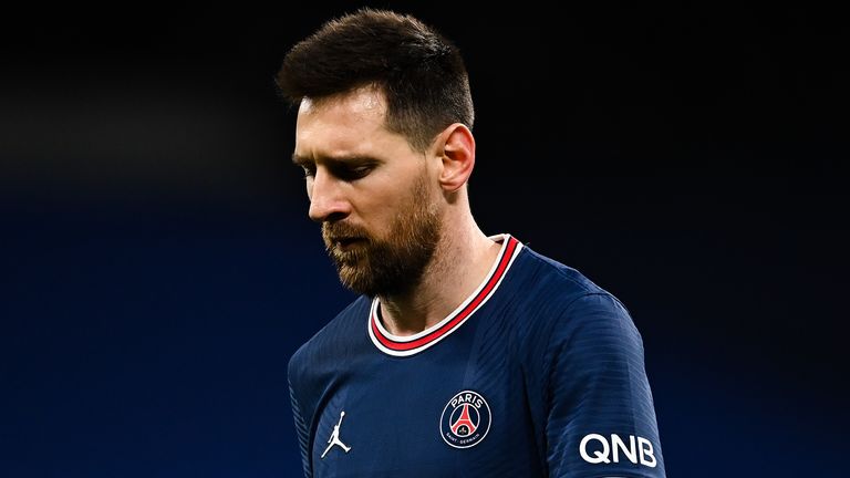 Lionel Messi looks dejected after PSG's loss to Real Madrid