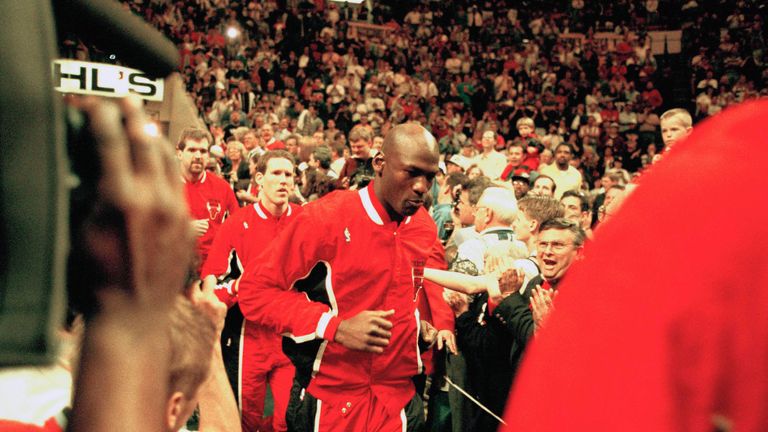 Chicago Bulls Guard Michael Jordan, center, joins his team as they enter Market Square Arena for their game with the Indiana Pacers, Sunday, March 19, 1995, Indianapolis, In. This game marked Jordan&#39;s return to the NBA after nearly 18 months.