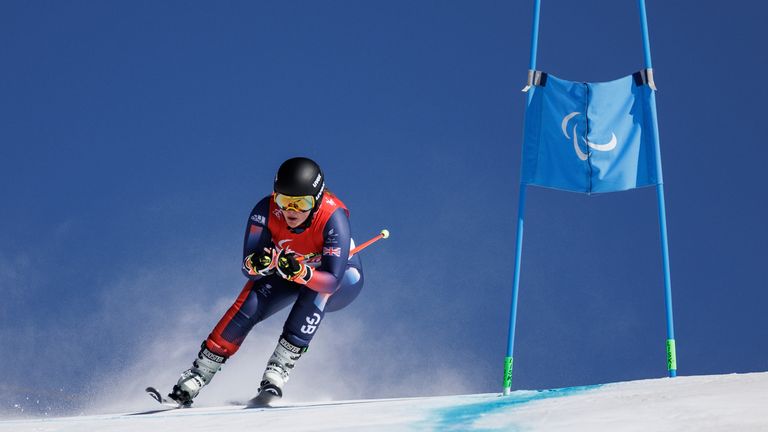 Millie Knight playing during an alpine ski race for women with Barra handicap in the Alps