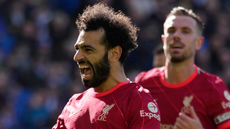 Mo Salah celebrates after doubling Liverpool&#39;s advantage with a penalty