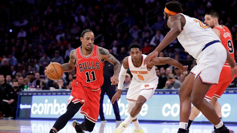 Chicago Bulls forward DeMar DeRozan (11) drives to the basket against the New York Knicks during the second half of an NBA basketball game Monday, March 28, 2022, in New York. The Knicks won 104-109. 
