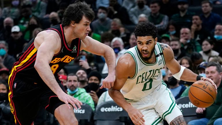 Boston Celtics forward Jayson Tatum (0) drives to the basket against Atlanta Hawks forward Danilo Gallinari