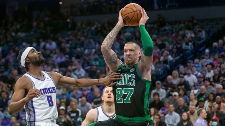 Boston Celtics center Daniel Theis (27) is defended by Sacramento Kings forward Maurice Harkless (8) during the first quarter of an NBA basketball game in Sacramento, Calif., Friday, March 18, 2022. (AP Photo/Randall Benton)


