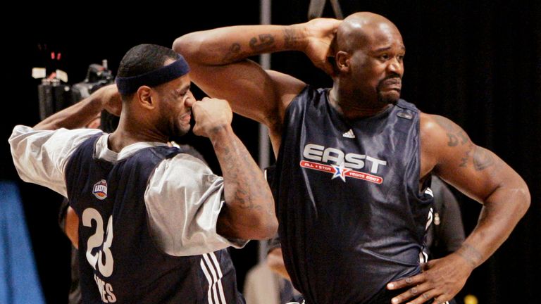 Shaquille O&#39;Neal, right, of the Miami Heat, and LeBron James of the Cleveland Cavaliers (23) dance together during NBA All-Star basketball practice in Las Vegas