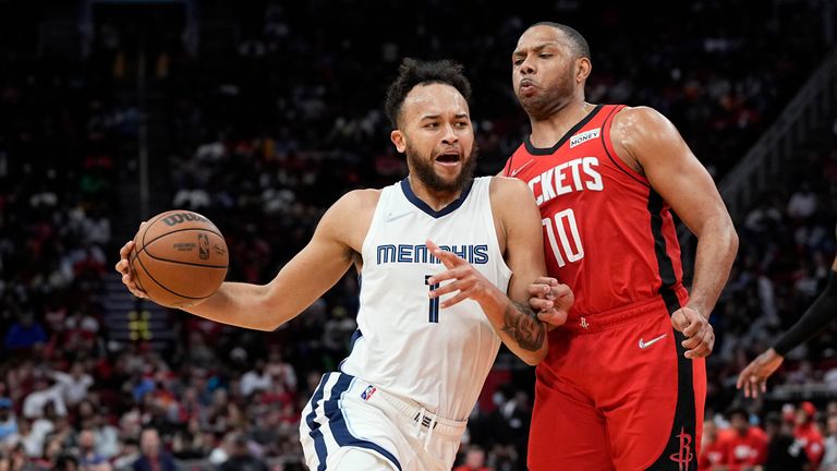 Memphis Grizzlies&#39; Kyle Anderson (1) drives toward the basket as Houston Rockets&#39; Eric Gordon (10) defends during the second half of an NBA basketball game Sunday, March 6, 2022, in Houston. The Rockets won 123-112. (AP Photo/David J. Phillip)


