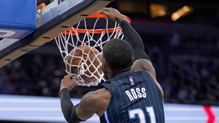 Orlando Magic guard Terrence Ross (31) makes an uncontested dunk against the Sacramento Kings during the second half of an NBA basketball game, Saturday, March 26, 2022, in Orlando, Fla. (AP Photo/John Raoux)