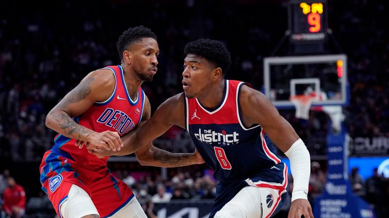 Washington Wizards forward Rui Hachimura (8) is defended by Detroit Pistons guard Rodney McGruder during the second half of an NBA basketball game, Friday, March 25, 2022, in Detroit. (AP Photo/Carlos Osorio)


