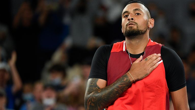 Nick Kyrgios of Australia reacts after defeating Liam Broady of Britain in their first round match at the Australian Open tennis championships in Melbourne, Australia, Tuesday, Jan. 18, 2022. (AP Photo/Andy Brownbill)