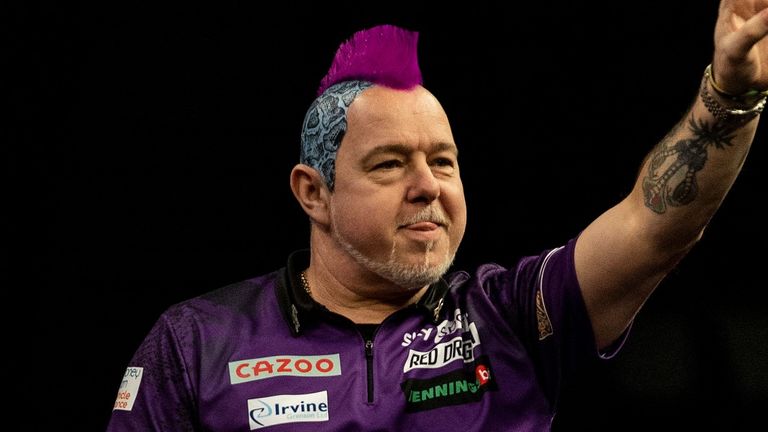 Peter Wright during the walk on in the quarter final during the 2022 Cazoo Premier League in Brighton. (Pic: Steven Paston/PDC)