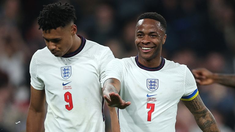 Raheem Sterling celebrates after doubling England's advantage over Ivory Coast