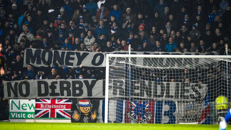  Rangers fans show a banner against the friendly in Australia during their 1-0 win at St Johnstone