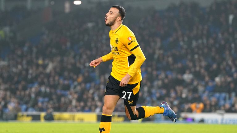 Romain Saiss celebrates scoring their side&#39;s first goal of the game during the Premier League match at AMEX Stadium, Brighton