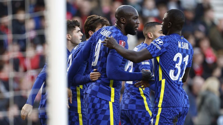 Romelu Lukaku is congratulated by his team-mates after giving Chelsea the lead