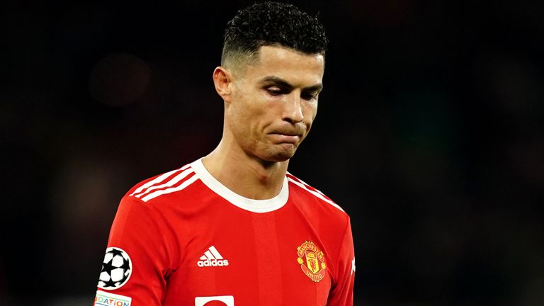 Cristiano Ronaldo walks off dejected after Manchester United&#39;s Champions League exit at the hands of Atletico Madrid