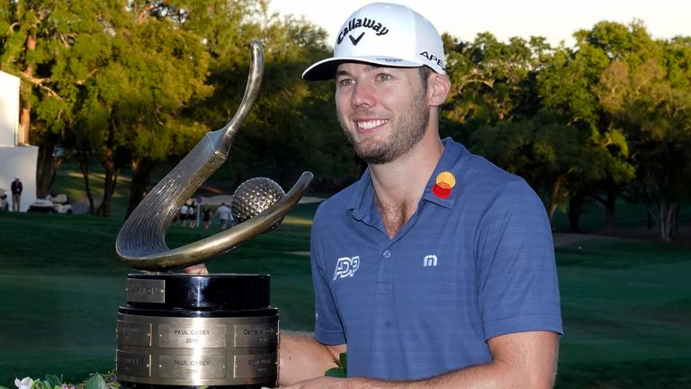 Sam Burns poses with the trophy after winning the Valspar Championship