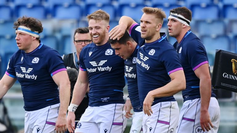 Sam Johnson celebrates after scoring Scotland's opening try of the Test