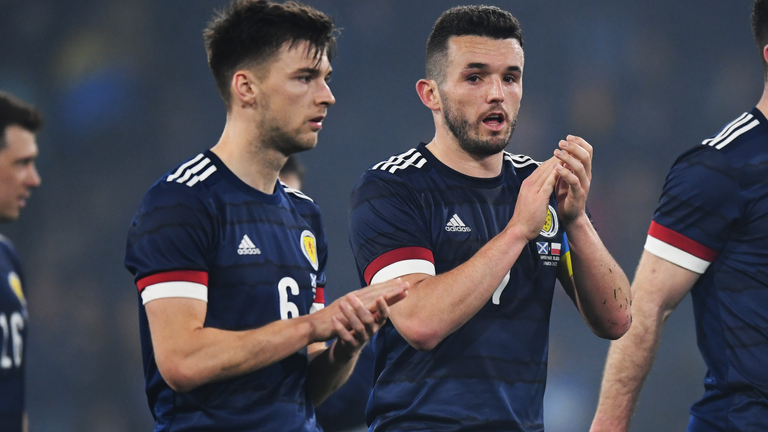 John McGinn and Kieran Tierney (left)