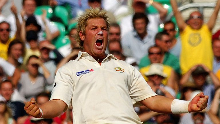 Australia&#39;s Shane Warne celebrates after he caught and bowled England&#39;s Andrew Flintoff for 8 runs during the final day of the fifth npower Test match at the Brit Oval, London, Monday September 12, 2005. 