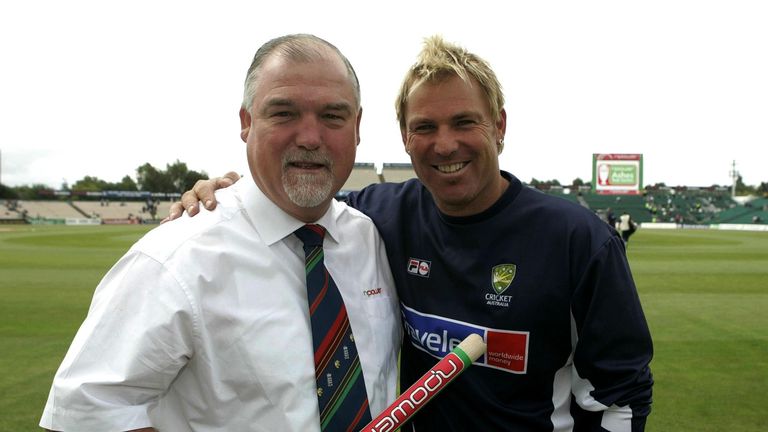 File photo dated 12-08-2005 of Former England batsman Mike Gatting (L) congratulates Australia leg-spin bowler Shane Warne on passing 600 Test match wickets. 